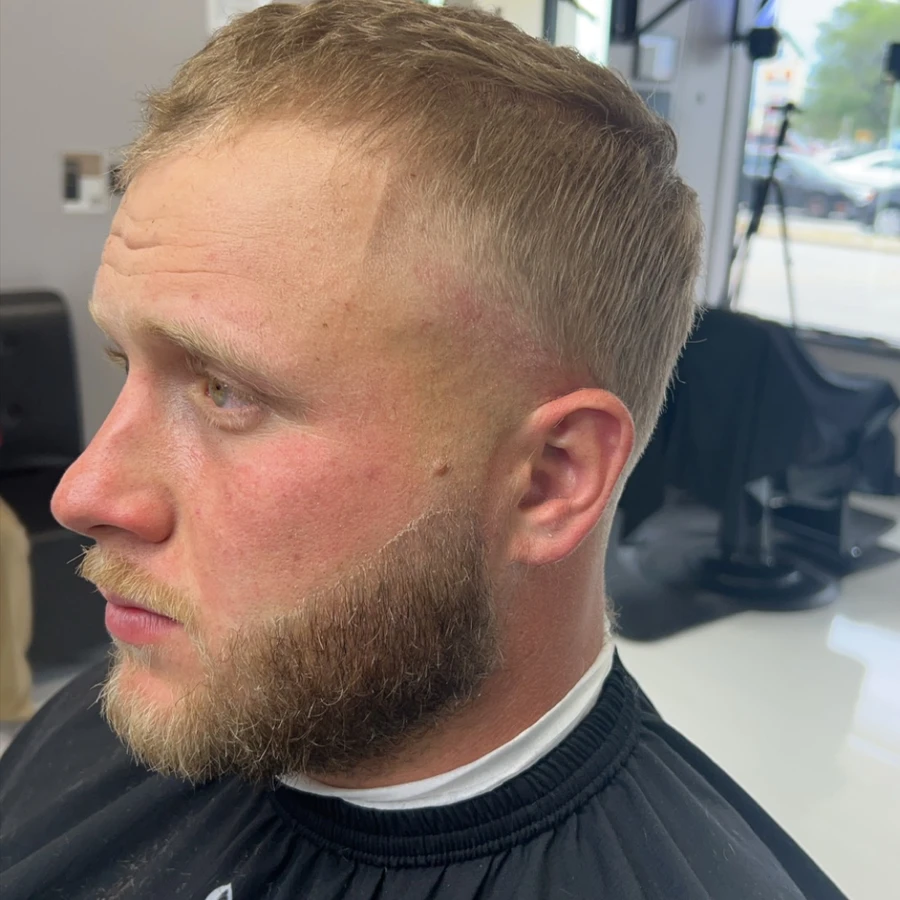 Short haircut and shaped beard with the full face in side profile from Norie’s theCut portfolio